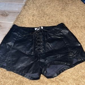 Black leather shorts with ties